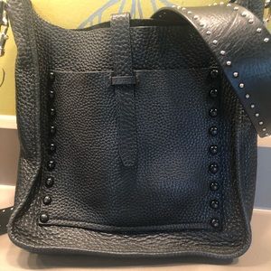 Rebecca Minkoff large feedbag and guitar strap.